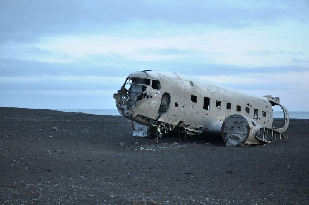 The plane wreck on the moon—er, rather, near Skógafoss, a destination for photographers.