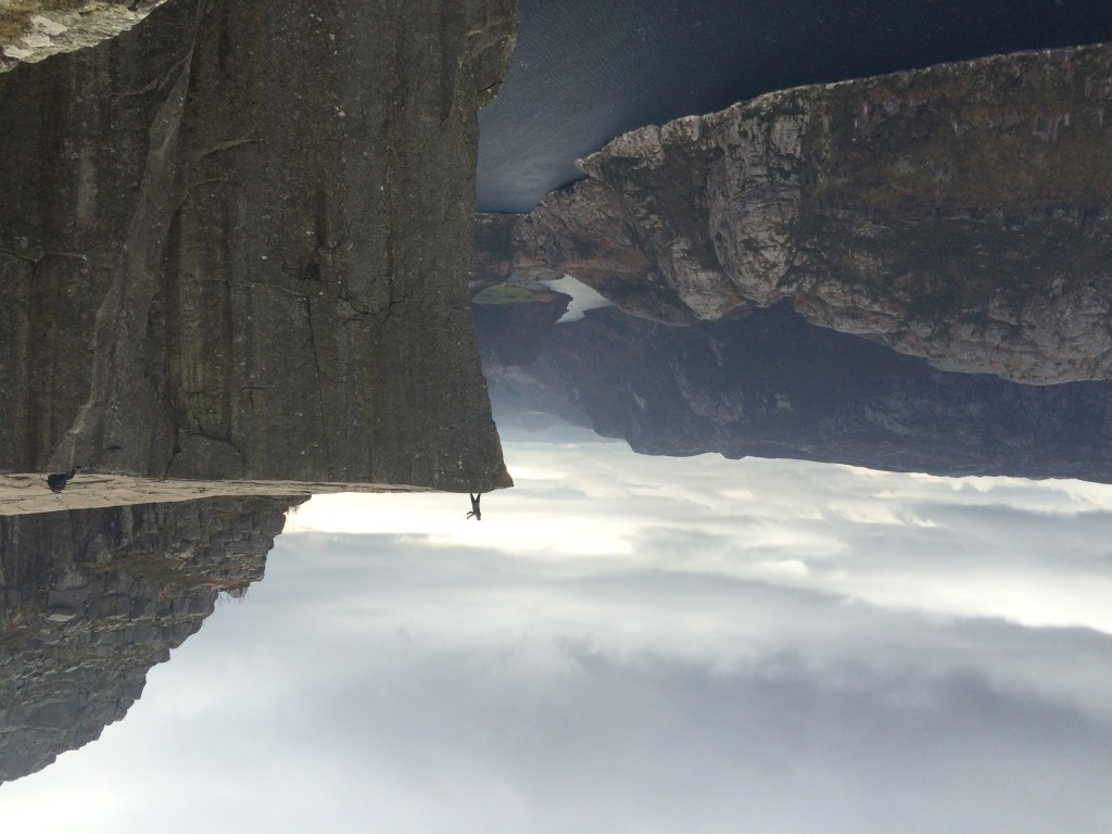 My first sight of Prekestolen. Lysefjord below. Is that man taking a selfie or doing tai chi? (Notably, the Norweigans have developed the term "fjellfie," or "mountain selfie"; I admit I think it's cute.)