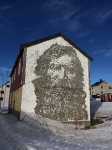 Carved into the painted stone.