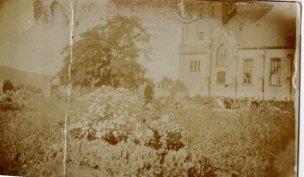 Historical photograph of the burial place of my great-great-grandfather, Gustav Hansen, at Lillehammer Church, 1906.