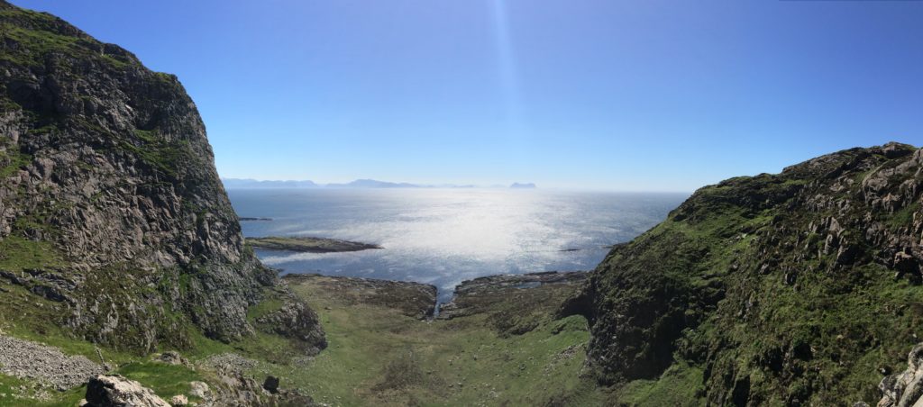 Looking southward along the west coast from the windswept saddle east of Kinnaklova.